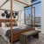 large bedroom with windows