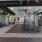 Fitness room with multiple treadmills, free weights, and weight machines