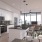 a kitchen with white cabinets