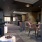 a room with chairs and tables