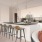 a kitchen with a couch and a table