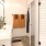 a bathroom with a tub sink and shower