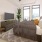a living room with a couch and a tv