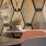 a table with chairs and a lamp